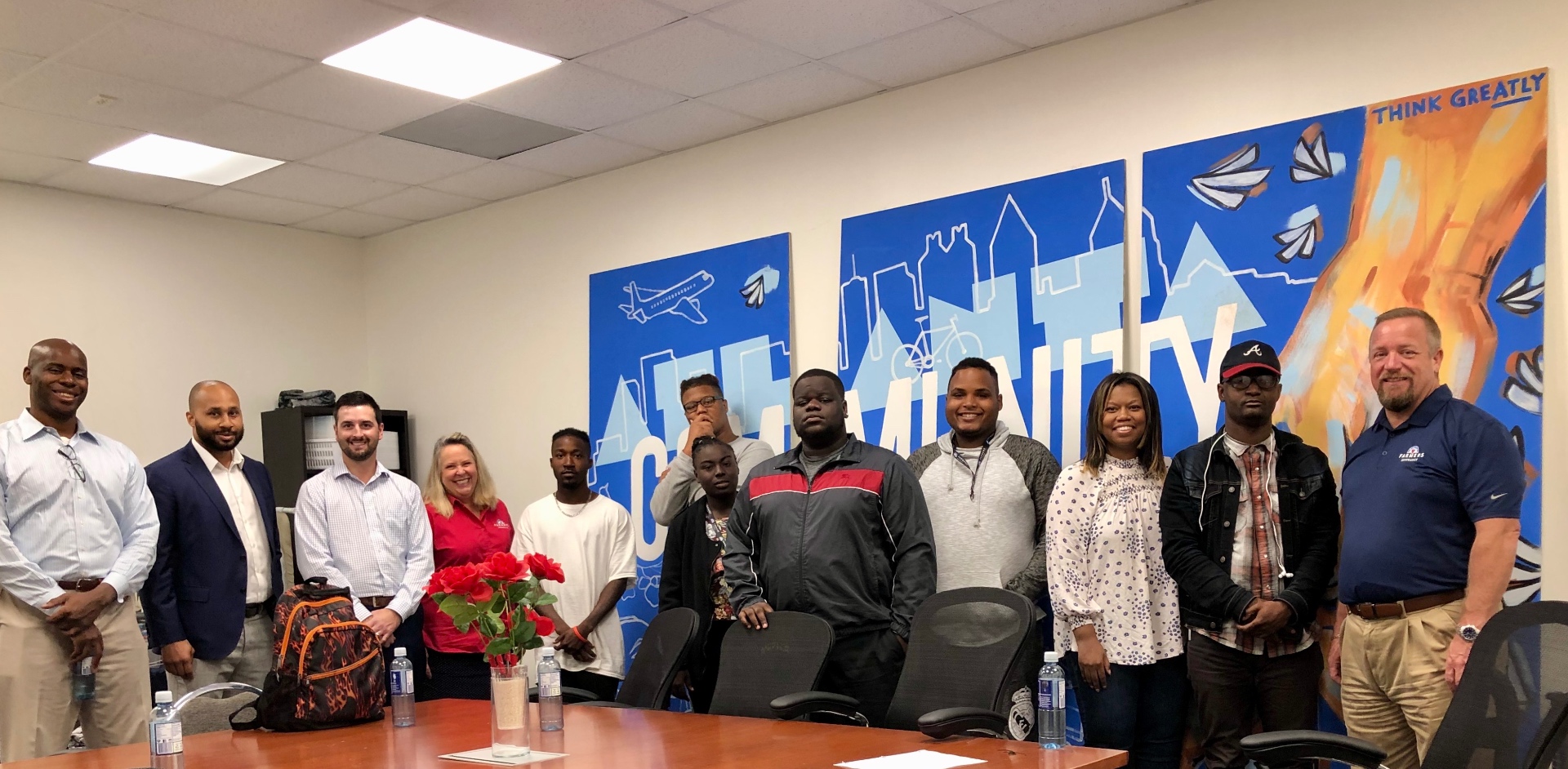 Makeda Coleman and team with agency owners at a career luncheon learning event at CHRIS 180.